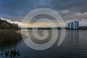 Multi-storey houses on the shore of the lake