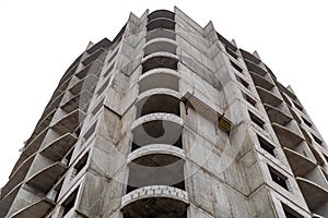 Multi-storey panel house under construction isolated on white background