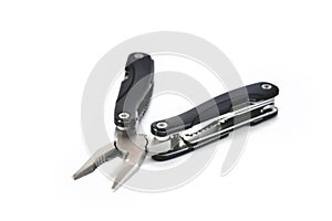 Multi tool black on a white background close-up