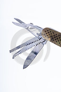 Multi-tool pocket folding with a camouflage pattern.