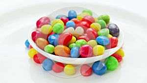 Multicolor bonbon sweets (ball candies) rotating