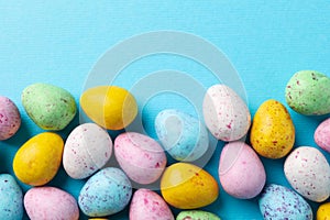 Multicolor Easter eggs on blue background