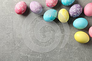 Multicolor Easter eggs on grey background
