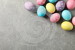 Multicolor Easter eggs on grey background
