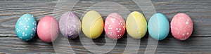 Multicolor Easter eggs on wooden background, space for text
