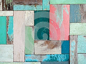 multicolor effective wood texture pattern background consists of several pieces of old wood of various sizes and colors.