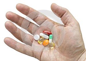 Multicolor pills in your palm