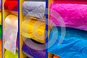 Multicolor rolls of polyethylene film in stock. Modern warehouse and storage systems