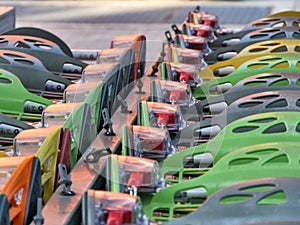 Multicolor shopping carts outside of shopping mall close up slective focus