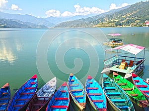 Multicolore tourist boats of Lake Pheva