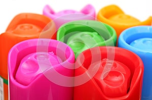 Multicolored aerosol cans