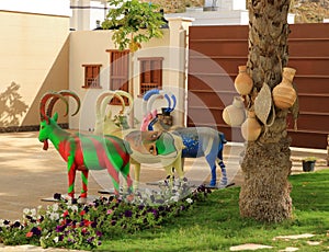 Multicolored arabian oryxes Oryx leucoryx statue in oman