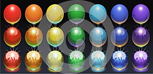 Multicolored balls on a dark background, illuminated from below, made of matte, metal and glass material photo