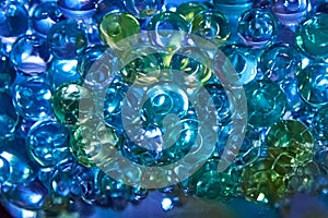 Multicolored blue and green air freshener bubbles, close-up
