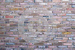 Multicolored brick wall for background