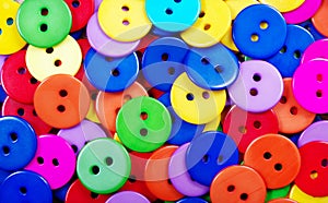 Multicolored buttons texture background.