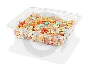 Multicolored candy in a disposable plastic container