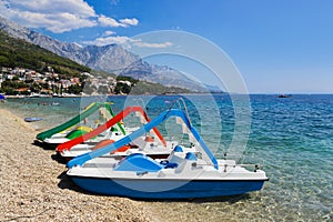 Multicolored catamaran on beach at Croatia