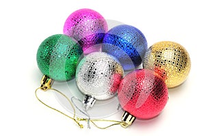 Multicolored christmas balls for new year tree on white background