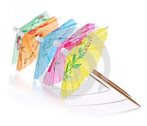 Multicolored Cocktail Umbrellas. Vacation and summer symbol, isolated