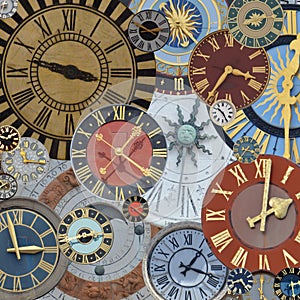 Multicolored collection of ancient church tower clocks on a pile