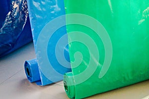 Multicolored colored bright motley rolls of plastic film. Chemical production, high-pressure polyethylene