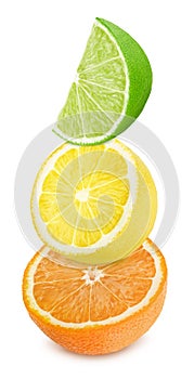 Multicolored composition with slices of citrus fruits - orange, lemon and lime isolated on a white background.