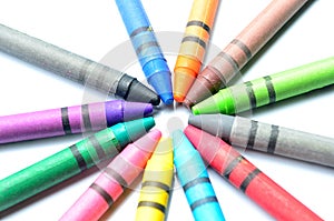 Multicolored crayons on a white background
