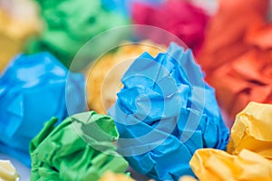 Multicolored crumpled paper balls macro