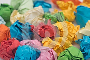 Multicolored crumpled paper balls macro