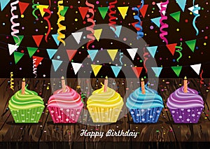 Multicolored cupcakes with candle. Happy Birthday. Garland with