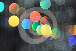Multicolored defocused blurred abstract bokeh lights background, for use at graphic design or background material.