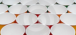 Multicolored disposable paper cups for drinks