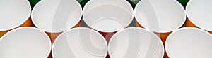 Multicolored disposable paper cups for drinks