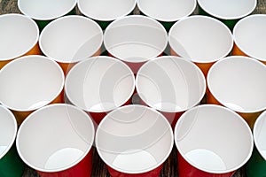 Multicolored disposable paper cups for drinks