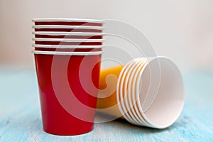 Multicolored disposable paper cups for drinks