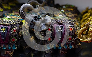 Multicolored elephant figure with trunk up