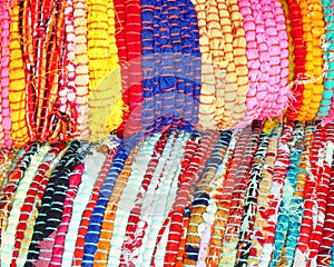 Multicolored ethnic carpets closeup