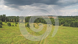 Multicolored European Countryside summer Landscape With Green Field