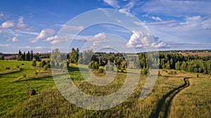 Multicolored European Countryside summer Landscape With Green Field