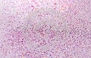 Multicolored glitters on white background