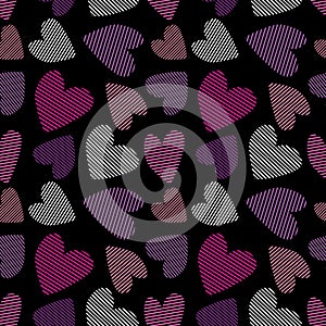 Multicolored hearts on a dark background. Seamless pattern design fabric wrapping paper wallpaper background.