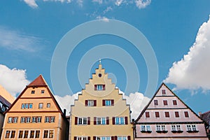 Multicolored houses with many windows in Rothenburg ob der Tauber in Germany.