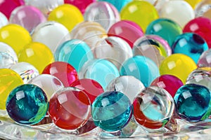 Multicolored jelly air freshener balls.