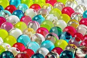 Multicolored jelly air freshener balls.