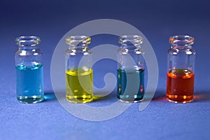 Multicolored liquids in glass vials