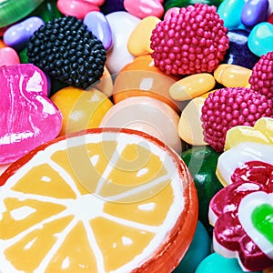 Multicolored lollipops, candy and chewing gum background