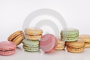 Multicolored macaroons with cream. French delicacy.