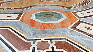 A multicolored marble floor in Milan, Italy.