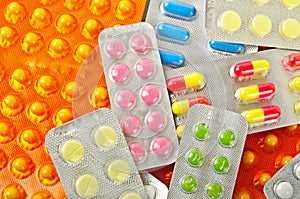 Multicolored medicine pills background